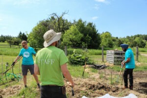 DJ and staff in garden